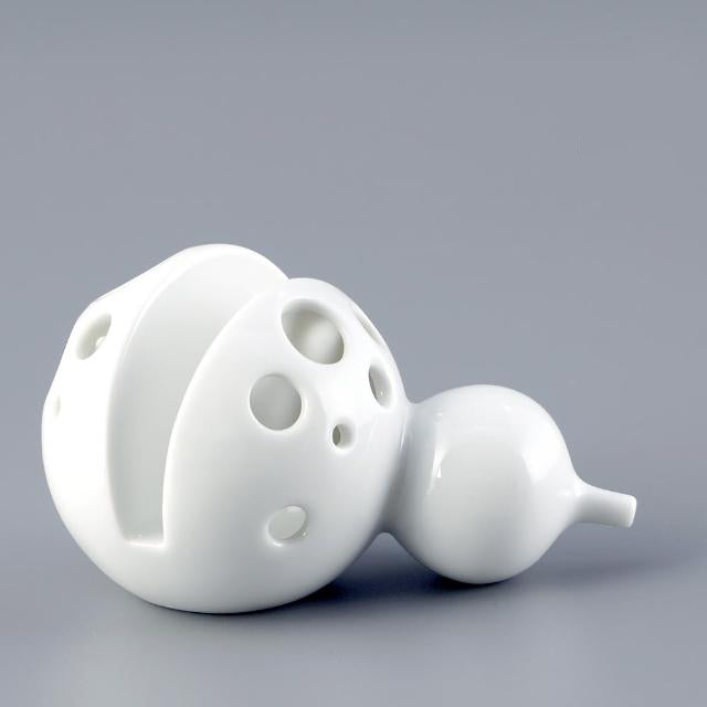 王俠軍設計的葫蘆造型名片座,結合文化意象與實用功能