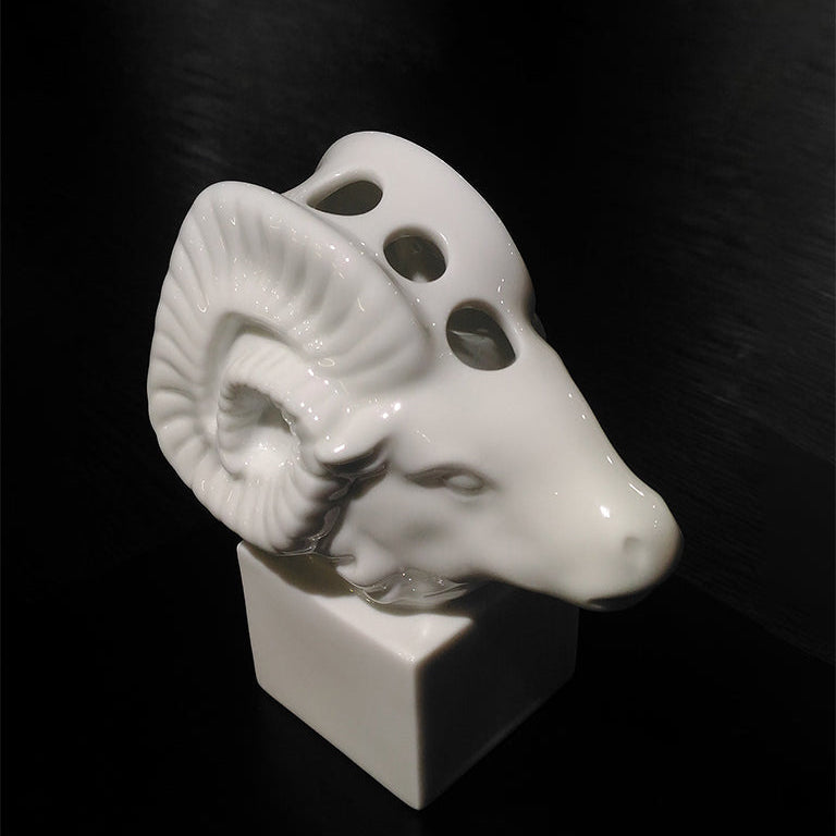 Leading Role porcelain zodiac ram pen holder, side profile of the curled horn, by Heinrich Wang